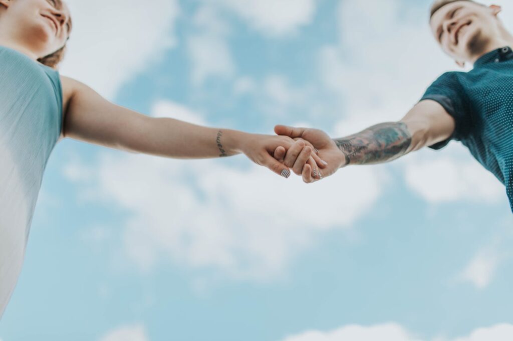 Couple Holding Each Others Hands