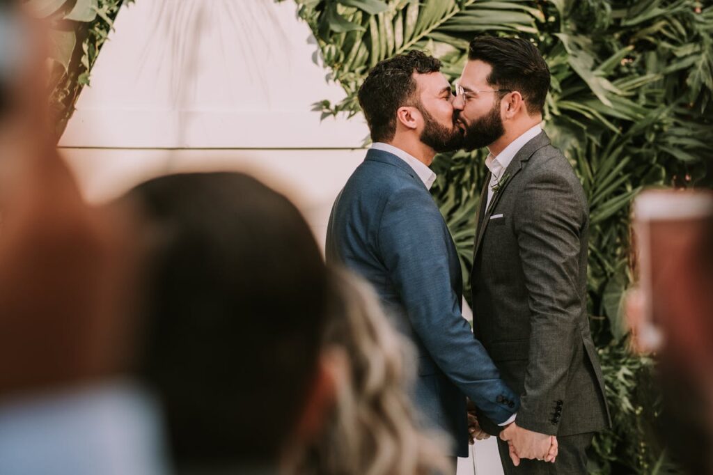 Men Wearing Suit Kissing in Front of People https://galabuzispells.com/love-spells/