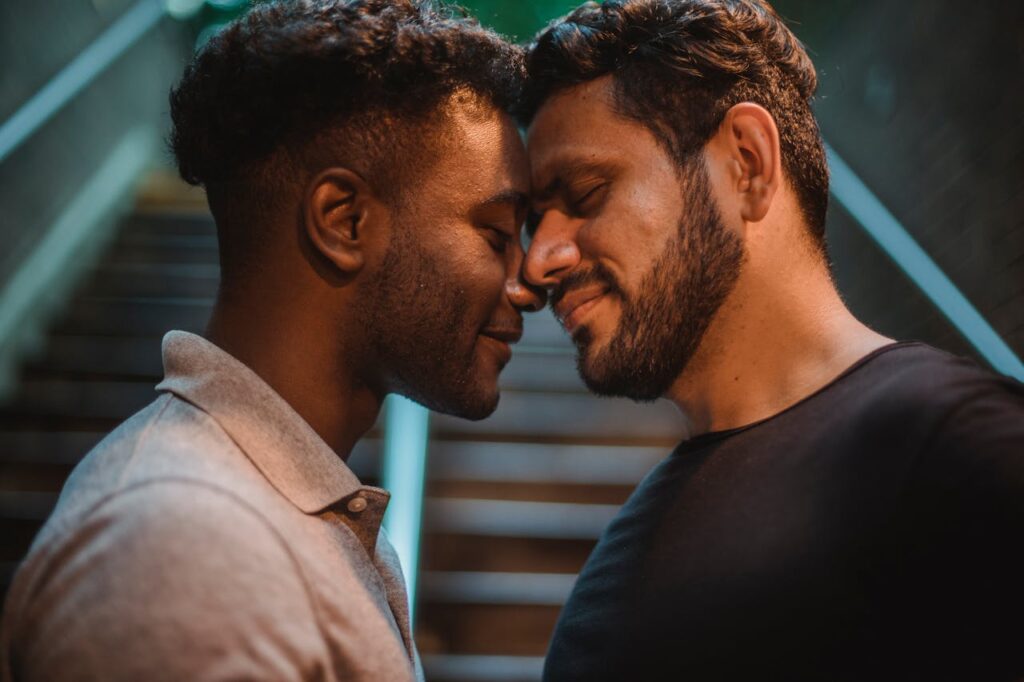 Men Posing Close Together